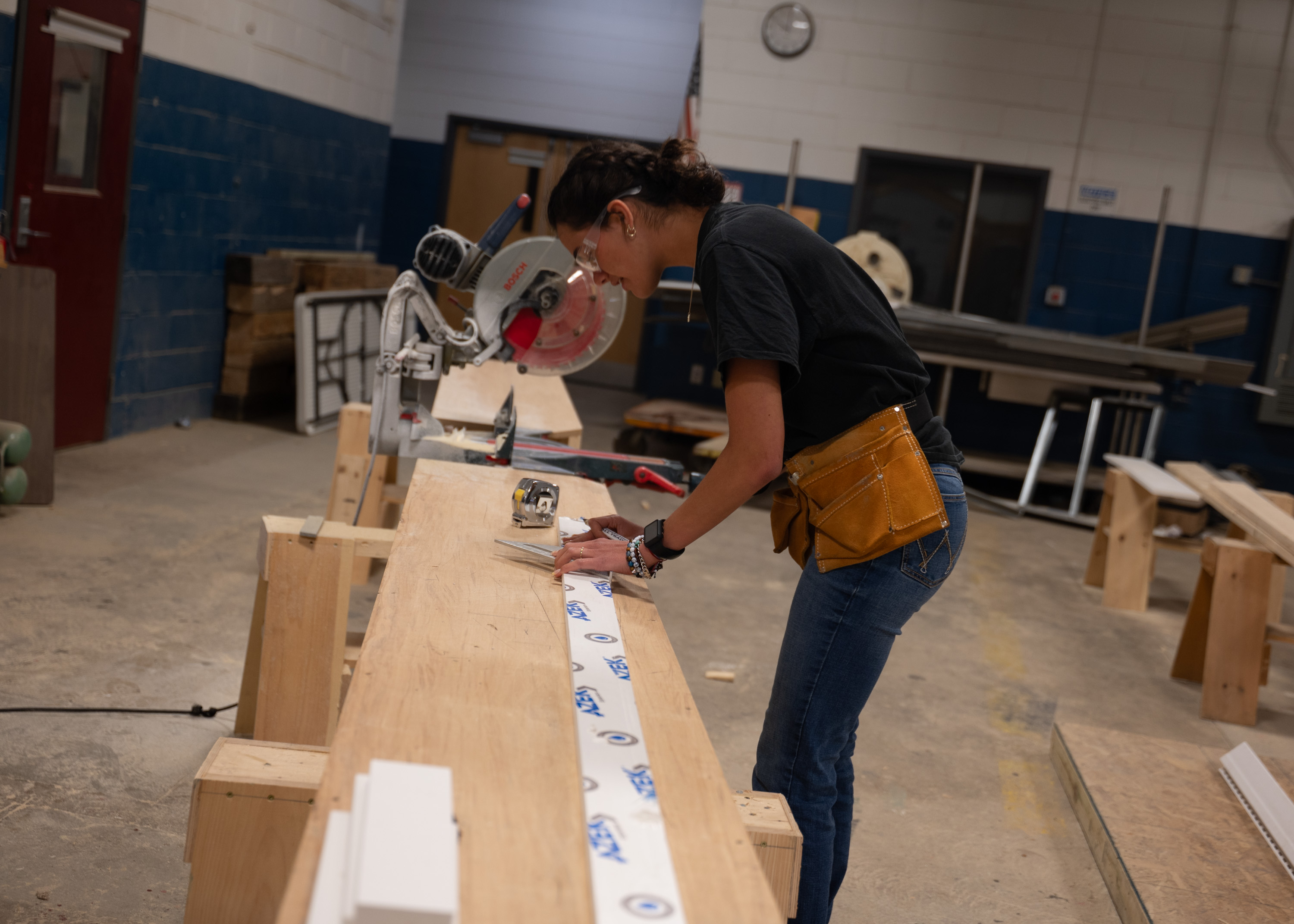 Student working in building construction shop